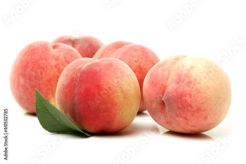 ripe peach on white background