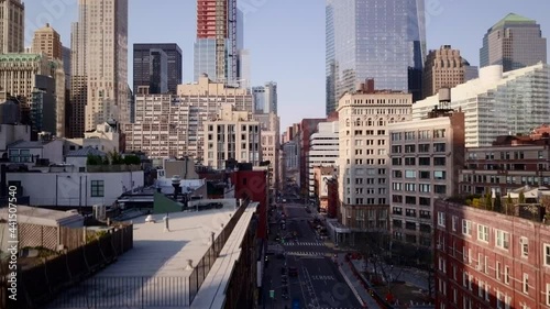 Drone shot rising over Tribeca neighborhood with Freedom tower in background