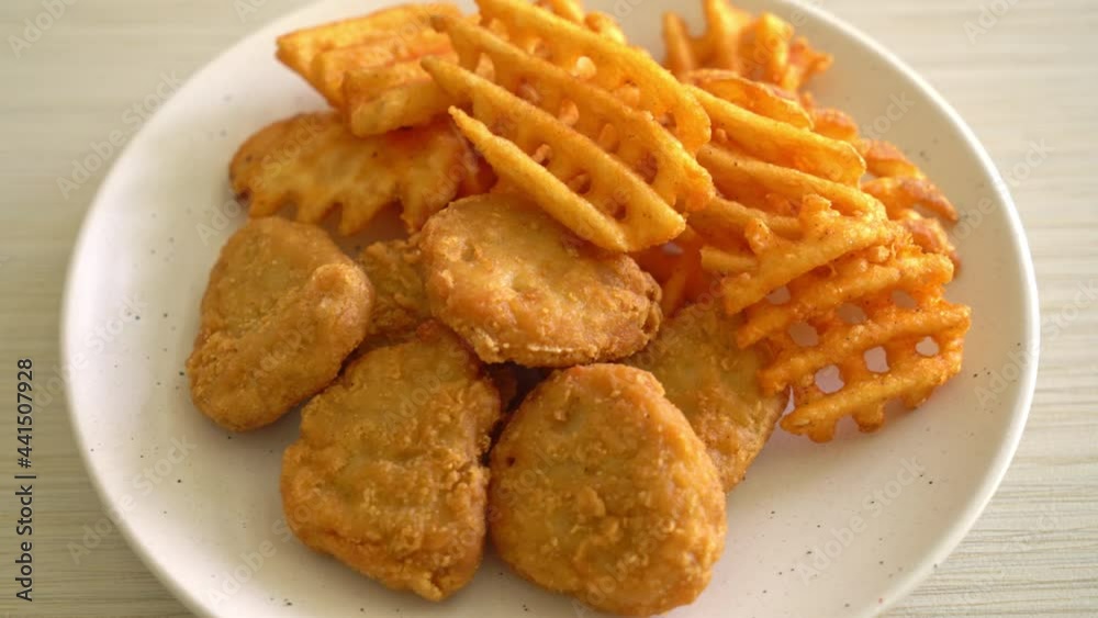 fried chicken nuggets with fried potatoes fried chicken nuggets with fried potatoes