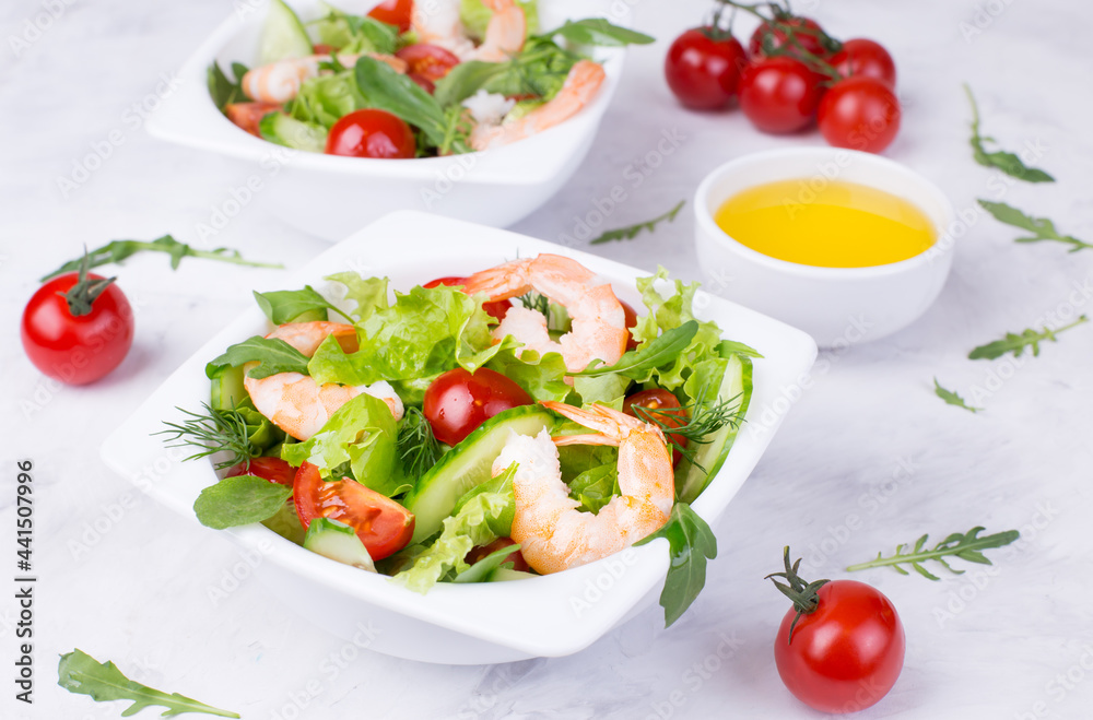 Delicious and healthy shrimp salad with herbs and tomatoes. Dietary nutrition for weight loss. Recipe for cooking fresh seafood. Mediterranean cuisine. Delicious and healthy shrimp salad with herbs and tomatoes. Dietary nutrition for weight loss. Recipe for cooking fresh seafood. Mediterranean cuisine.