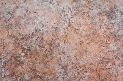 The pattern and texture of the beige granite surface. Like a natural stone background. An abstract image.