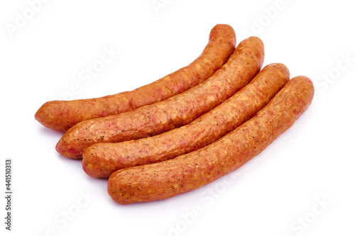 Smoked meat sticks, isolated on white background. High resolution image.