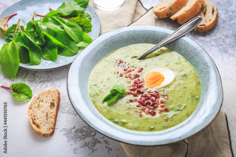 Creamy sorrel soup with egg and bacon bits Creamy sorrel soup with egg and bacon bits
