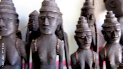 Timorese Carved Wood Statues of People On Atauro Island in Timor Leste photo