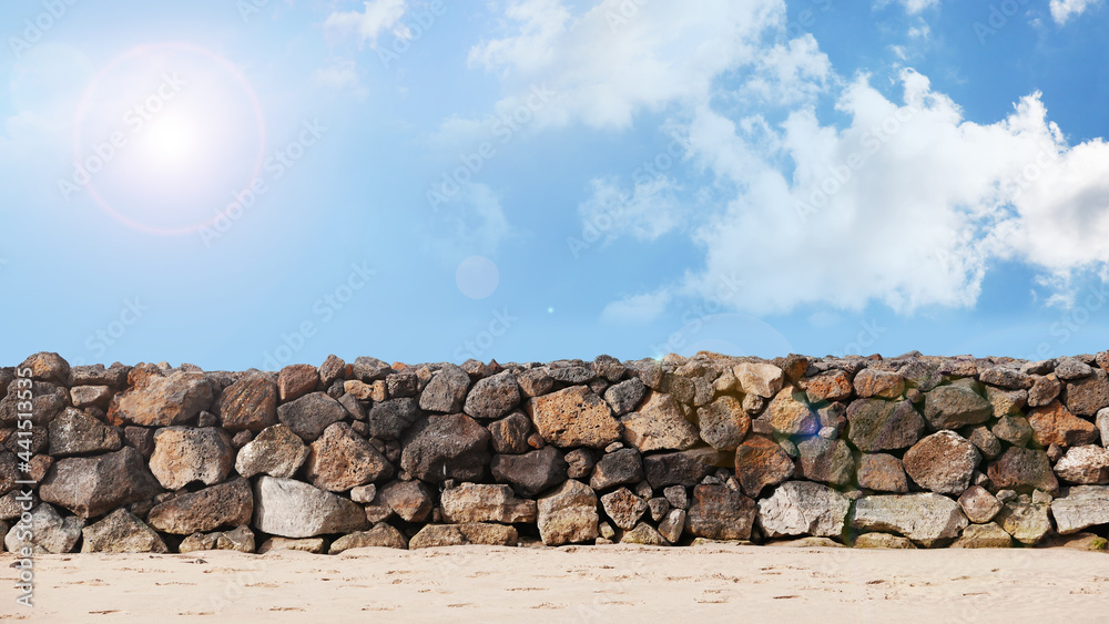Stone walls and clear skies in Jeju Island. Stone walls and clear skies in Jeju Island.