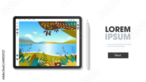 graphic tablet with beautiful landscape wallpaper on screen isolated on white background