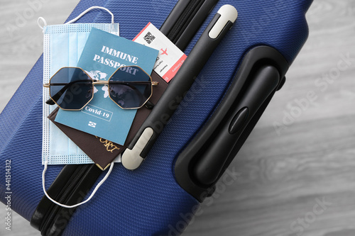 Immune passport, sunglasses...
