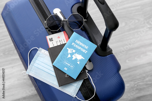 Immune passport, sunglasses...