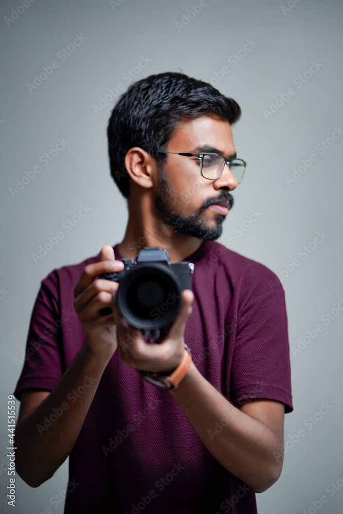 Fototapeta premium Photographer With Camera on white background.