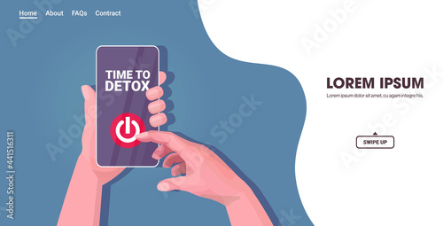 human hand pressing power off button on smartphone screen digital detox concept