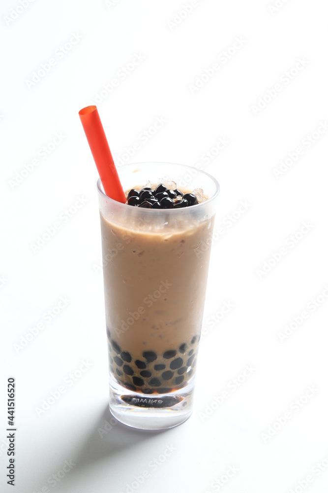Taiwan popular black boba bubble milk tea with ice in tall glass pearl drink menu in white background with red straw Taiwan popular black boba bubble milk tea with ice in tall glass pearl drink menu in white background with red straw