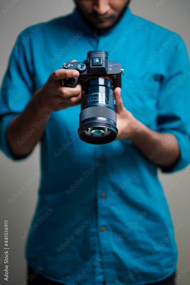 Fototapeta premium Photographer With Camera on white background.