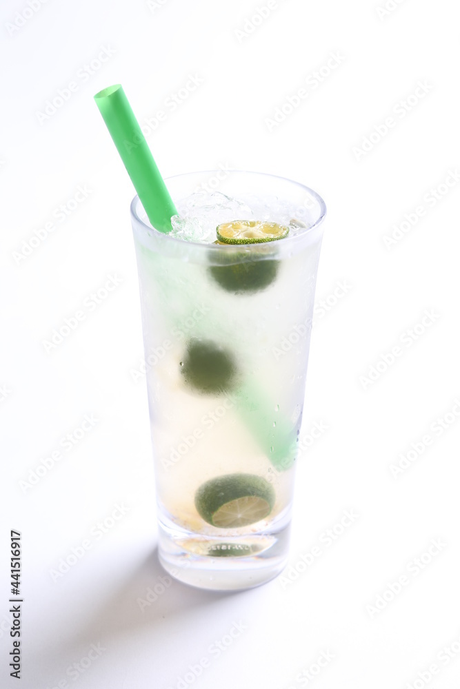ice cold chilled fresh sour lime fruit honey drink in glass and green straw beverage menu in white background ice cold chilled fresh sour lime fruit honey drink in glass and green straw beverage menu in white background
