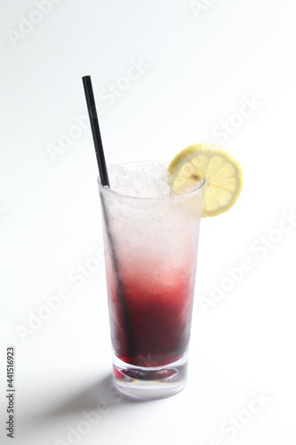 ice cold chilled fresh ribena grape lemon fruit honey drink in glass and yellow straw beverage menu in white background