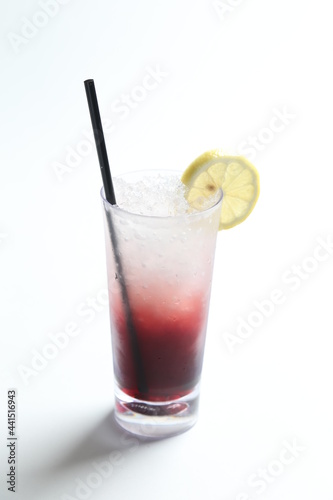 ice cold chilled fresh ribena grape lemon fruit honey drink in glass and yellow straw beverage menu in white background