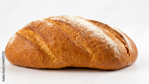 Loaf of bread isolated on white background. Whole bread. Horizontal frame. Studio. Crispy bread roll isolated against white background