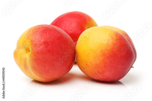 Fresh apricot fruits isolated on white background