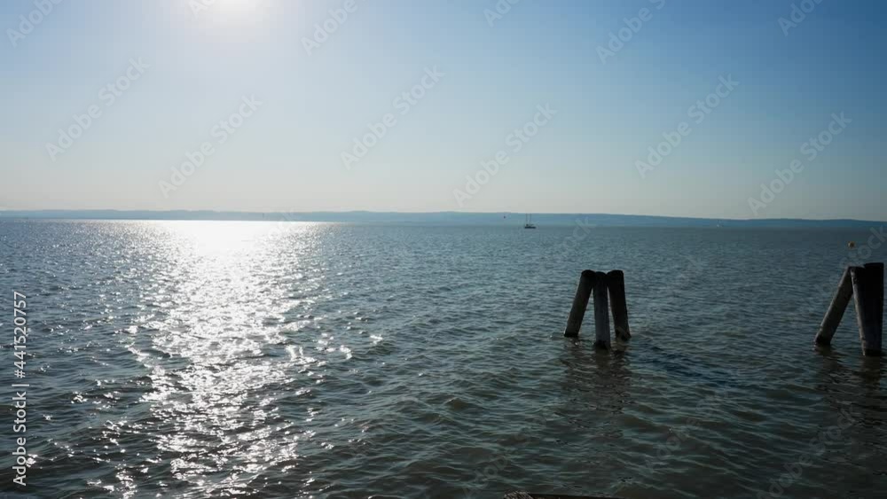 Blue horizon over Lake Neusiedler See, Podersdorf, Austria, static wide shot Blue horizon over Lake Neusiedler See, Podersdorf, Austria, static wide shot