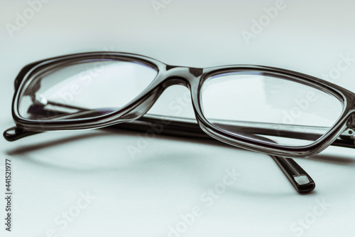 Stylish eyeglasses on the white background.