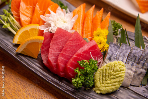 Japanese Sashimi sets with iemon and wasabi on plate.