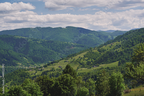 Fototapeta Naklejka Na Ścianę i Meble -  Clouds over the mountains. Sunny day in the mountains. Ukrainian Carpathian mountains. Svidovec ridge.
