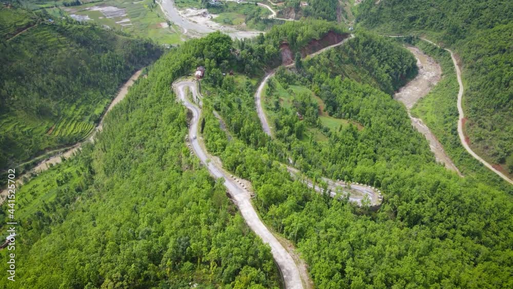 Drone following the car on the forest highway in Gulmi Nepal Drone following the car on the forest highway in Gulmi Nepal