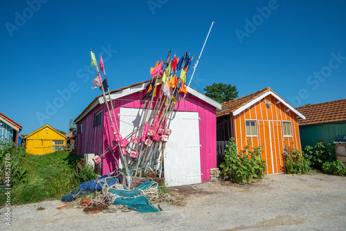 Colourful oyster farming huts at harbour on Oleron Island, Charente-Maritime, France photo