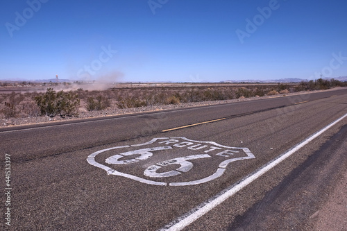 historic route 66  mojave desert  sign painted on asphalt