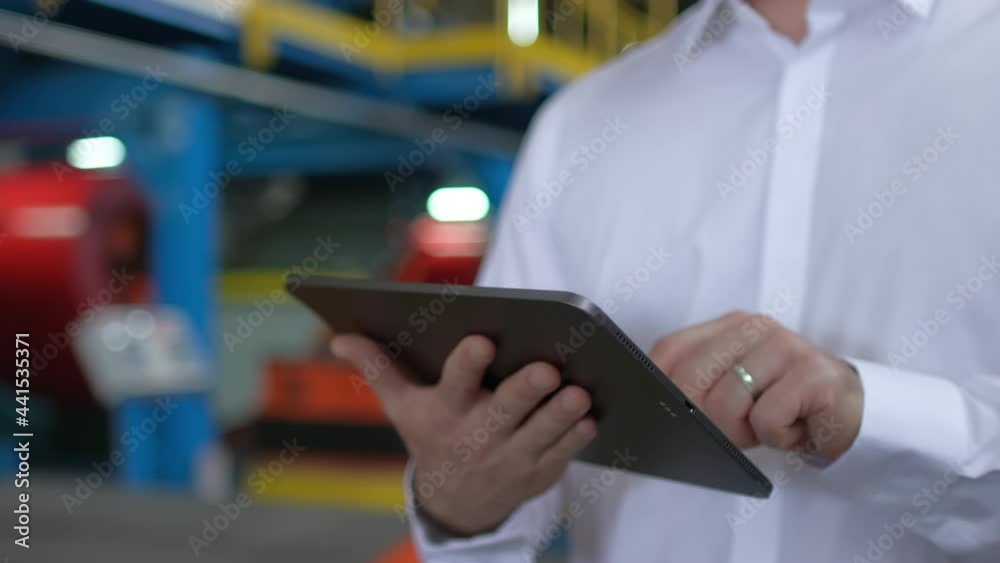 Architect male engineer man businessman in hard hat using tablet computer, engineering manufacture plant factory, worker working on production line in modern manufacturing Industry, business people