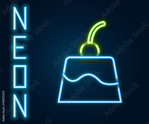 Glowing neon line Pudding custard with caramel glaze icon isolated on black background. Colorful outline concept. Vector