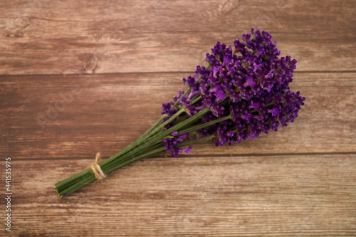 Bunch of lavender isolated on rustic wooden background