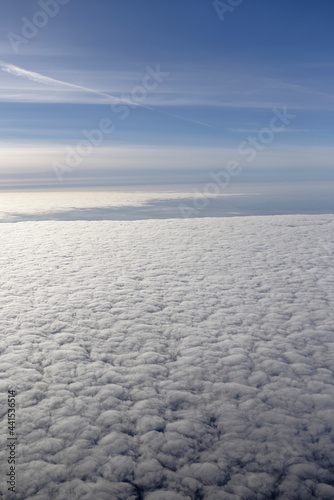 View of the Earth from under the wing of an aircraft