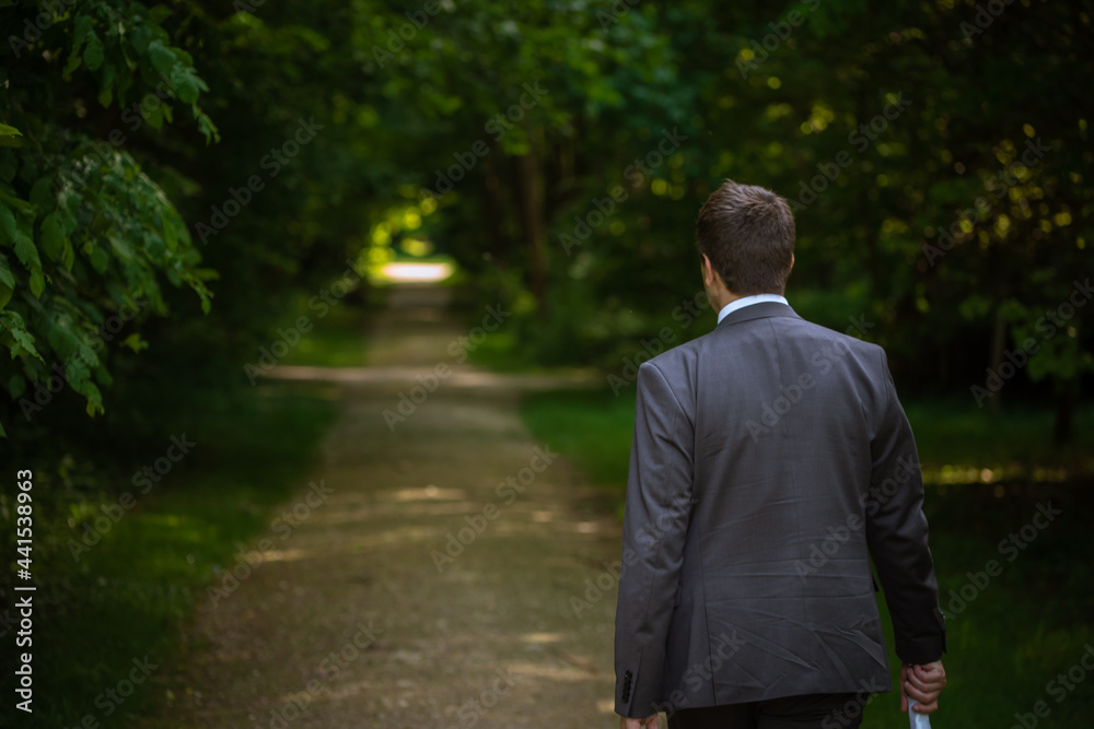 man walking in the park man walking in the park