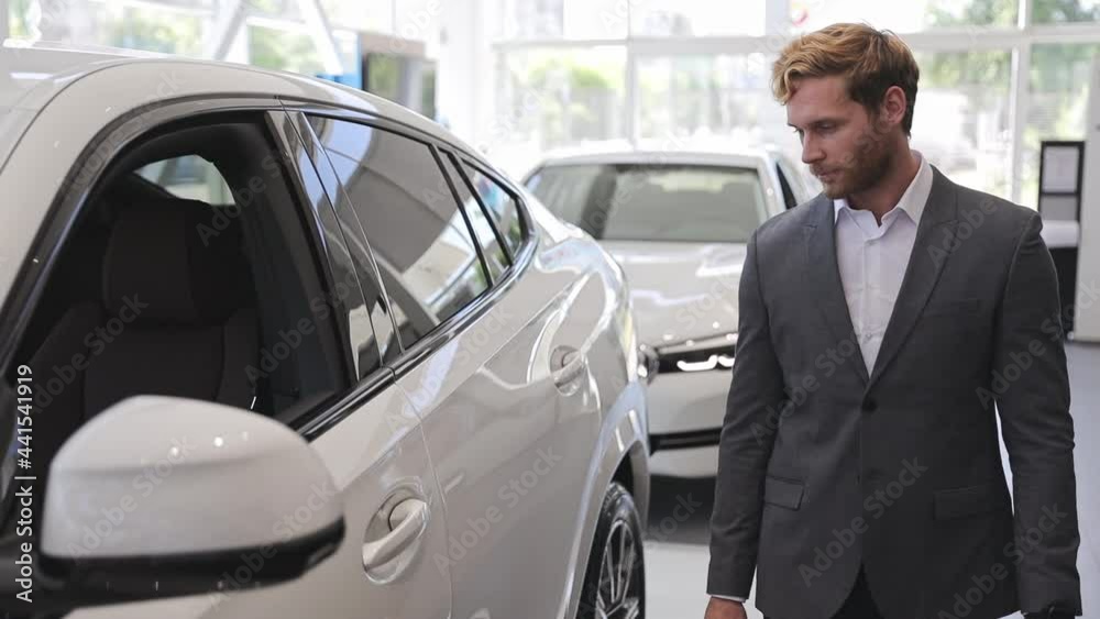 custom made wallpaper toronto digitalHappy adult man customer male buyer businessman client wears classic suit chooses auto wants to buy new automobile in car showroom vehicle salon dealership store motor show indoors. Car sales concept