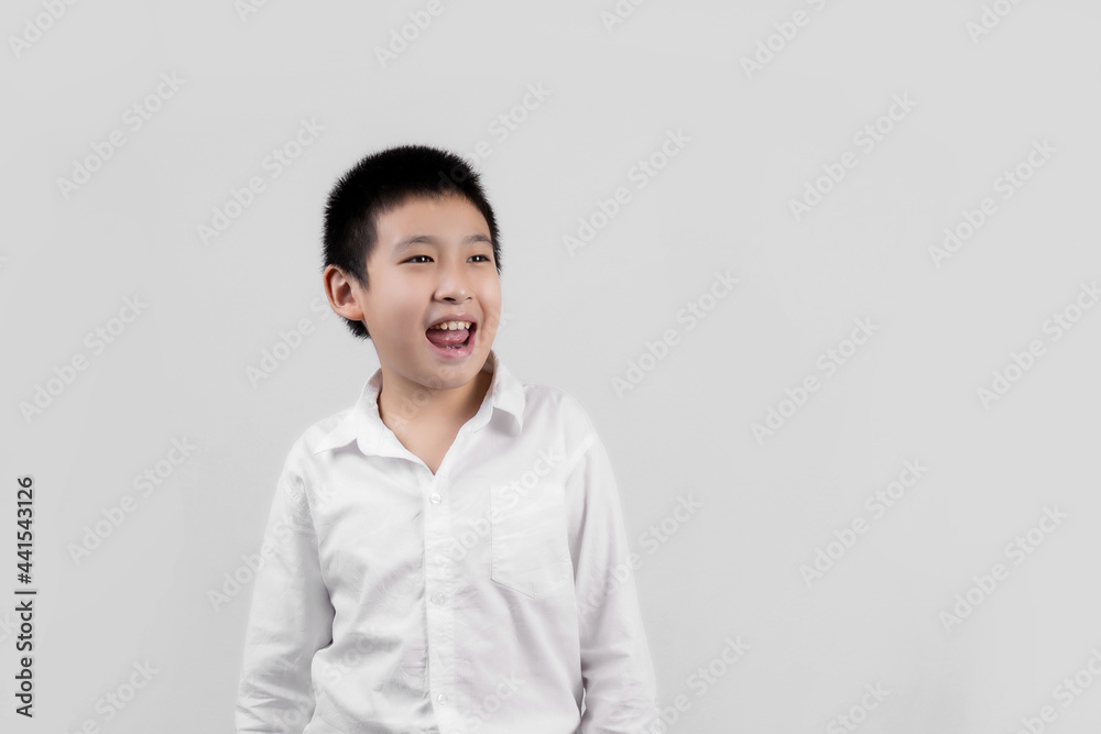 Asian boys studio portrait on gray background Asian boys studio portrait on gray background