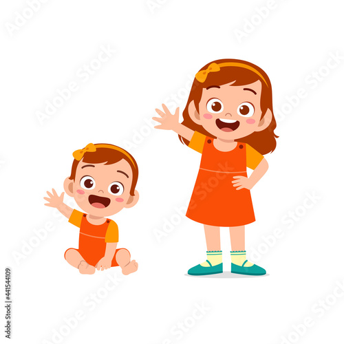 cute little girl say hello with young sister