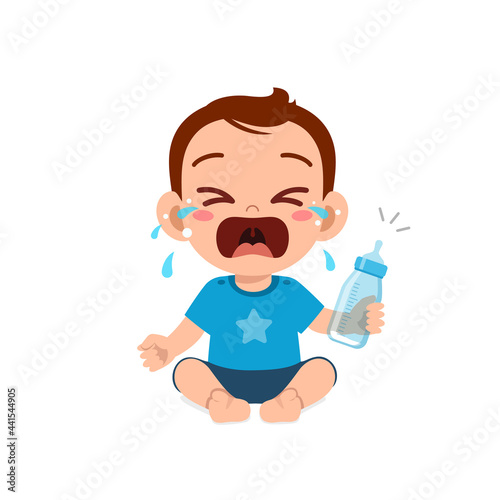 cute little baby boy cry holding empty milk bottle