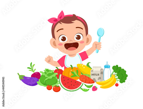 cute little baby girl eat fruit and vegetable