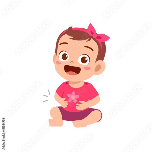 cute lttle baby girl feel full after eat and touch stomach