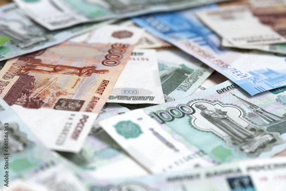 Russian money. Space for copy. Banknotes of different denominations. Concept of financial well-being. Close-up of Russian rubles. Finance concept. Background and texture of money.