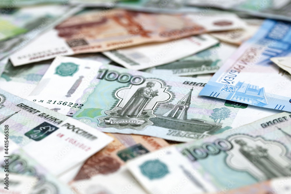 Banknotes of Russian rubles in different denominations, free space for text. View from above. Money. Copy space. Banknotes of Russian rubles in different denominations, free space for text. View from above. Money. Copy space.