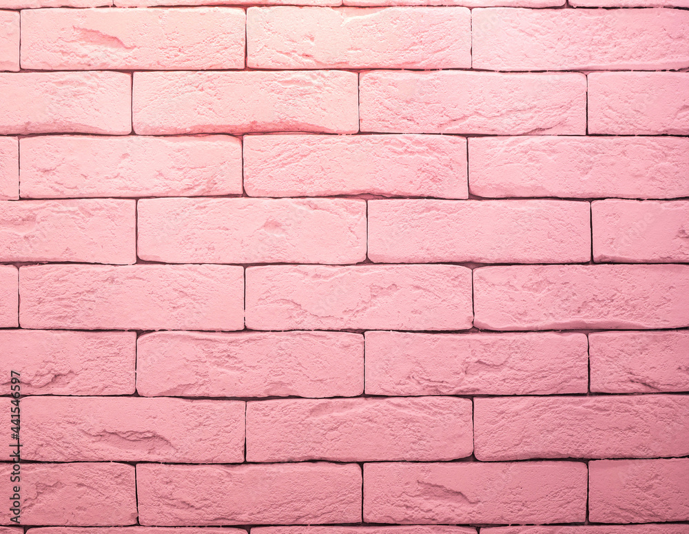 Brick wall is painted with pink paint. Abstract texture for background. Brick wall is painted with pink paint. Abstract texture for background.