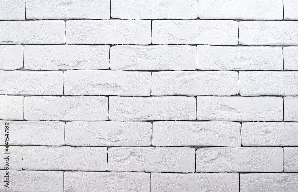 Obraz premium Brick wall is painted with white paint. Abstract texture for background.