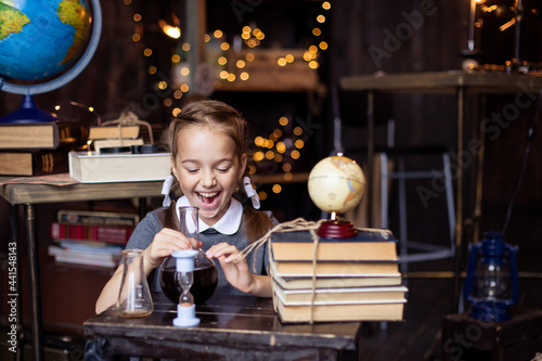 natural science chemistry lesson. Back to school. The student learns. The schoolgirl laughs. Pupil education elementary grades. positive emotions. New knowledge child development. Doing homework 