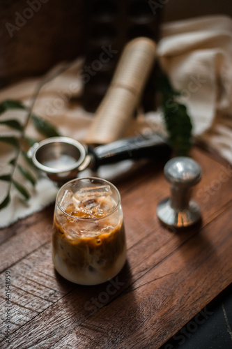 cold brew coffee with milk on wooden table