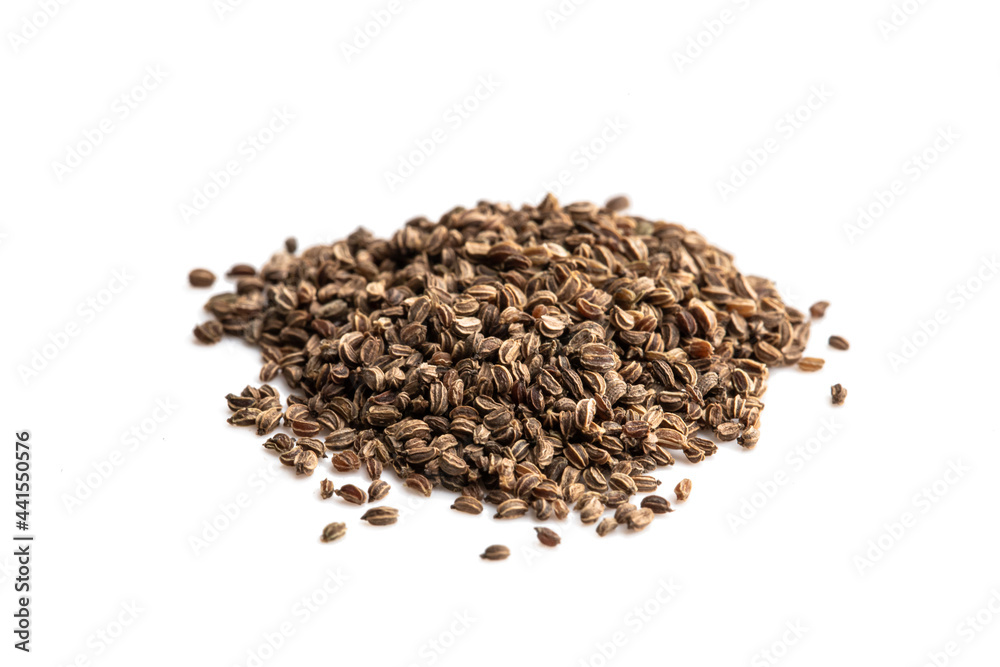 Pile of celery seeds isolated on white ready to plant Pile of celery seeds isolated on white ready to plant