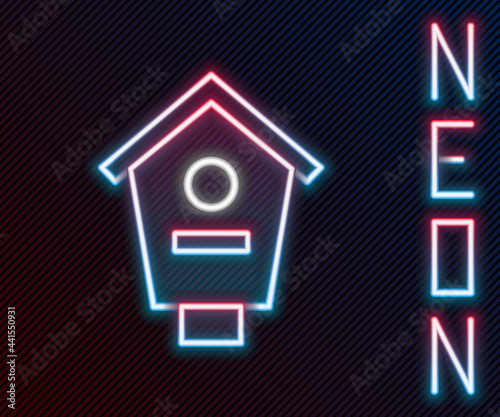 Glowing neon line Bird house icon isolated on black background. Nesting box birdhouse, homemade building for birds. Colorful outline concept. Vector