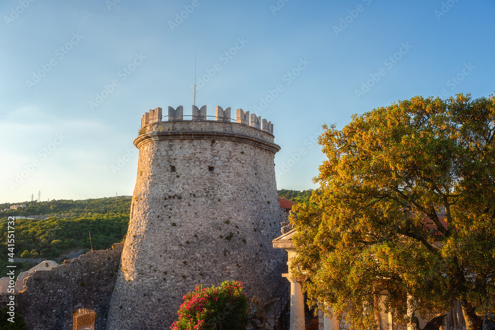 Trsat castle tower in Rijeka, Croatia. Medieval architecture, famous landmark in sunset light, outdoor travel background
