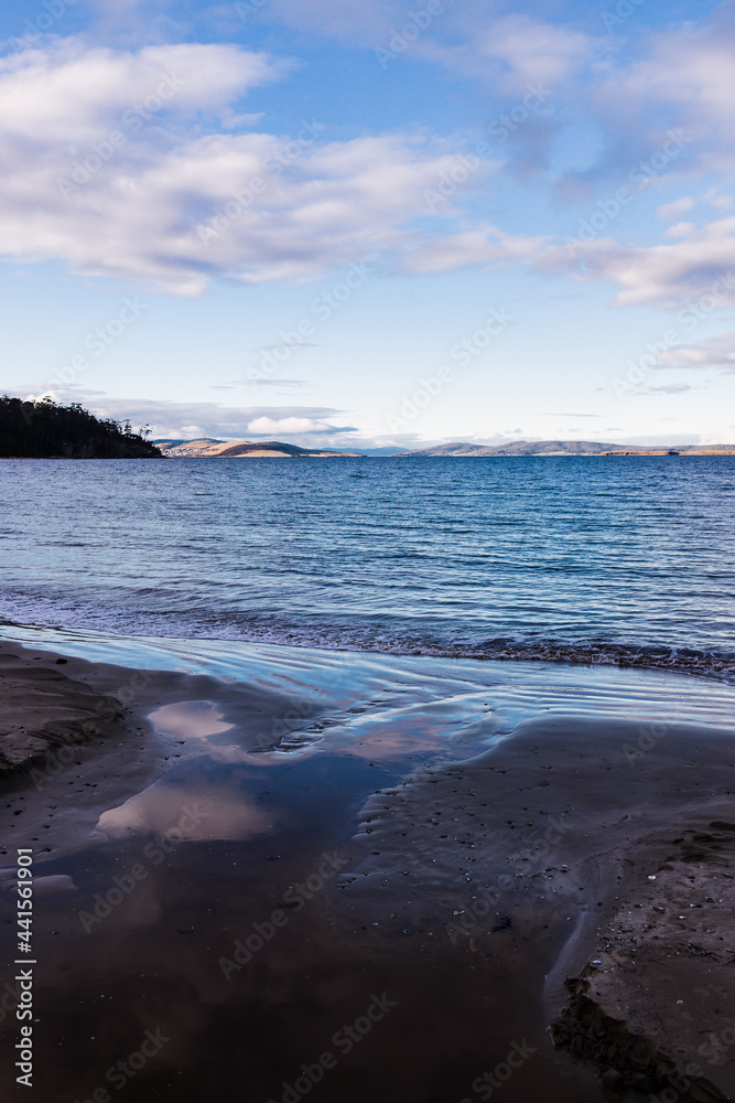 Fototapeta premium beautiful beach view at dusk in Kingston Beach in Southern Tasmania in winter