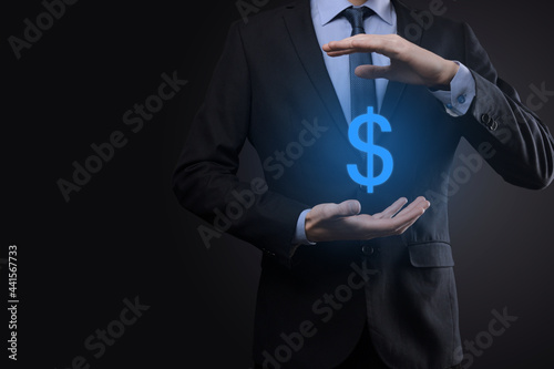 Successful international financial symbol sinvestment concept with businessman man person hold showing growth, charts and dollar sign, digital technology